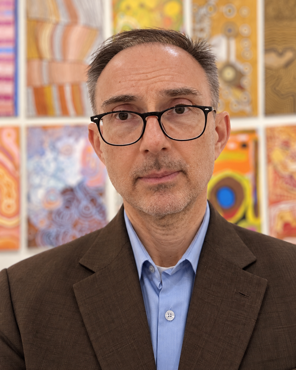 Raymond John Uzwyshyn in an art gallery
